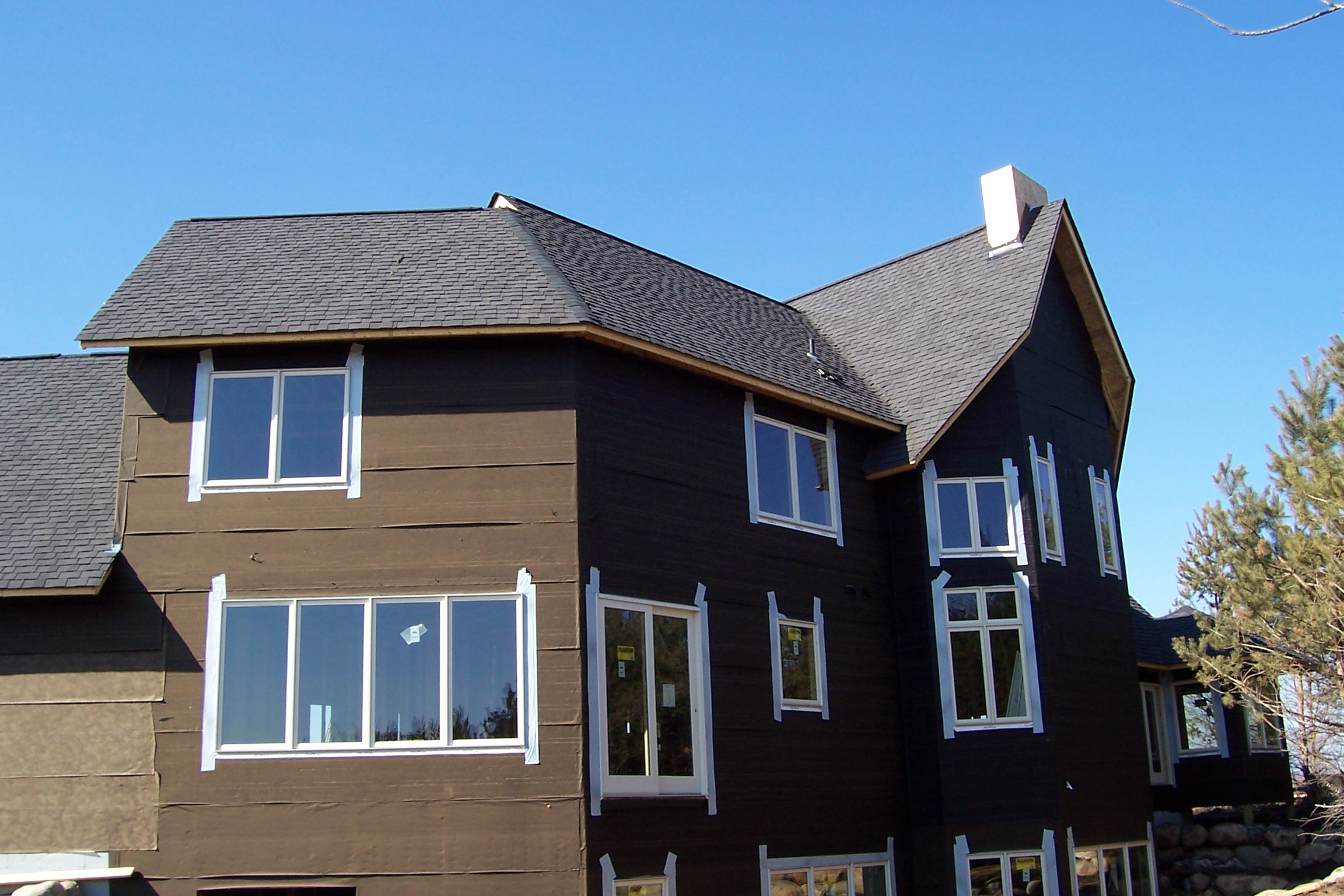 Asphalt shingle roof replacement on two-story home in Woodbury, MN